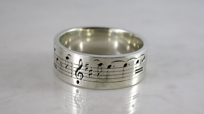 Обручальное кольцо с нотами